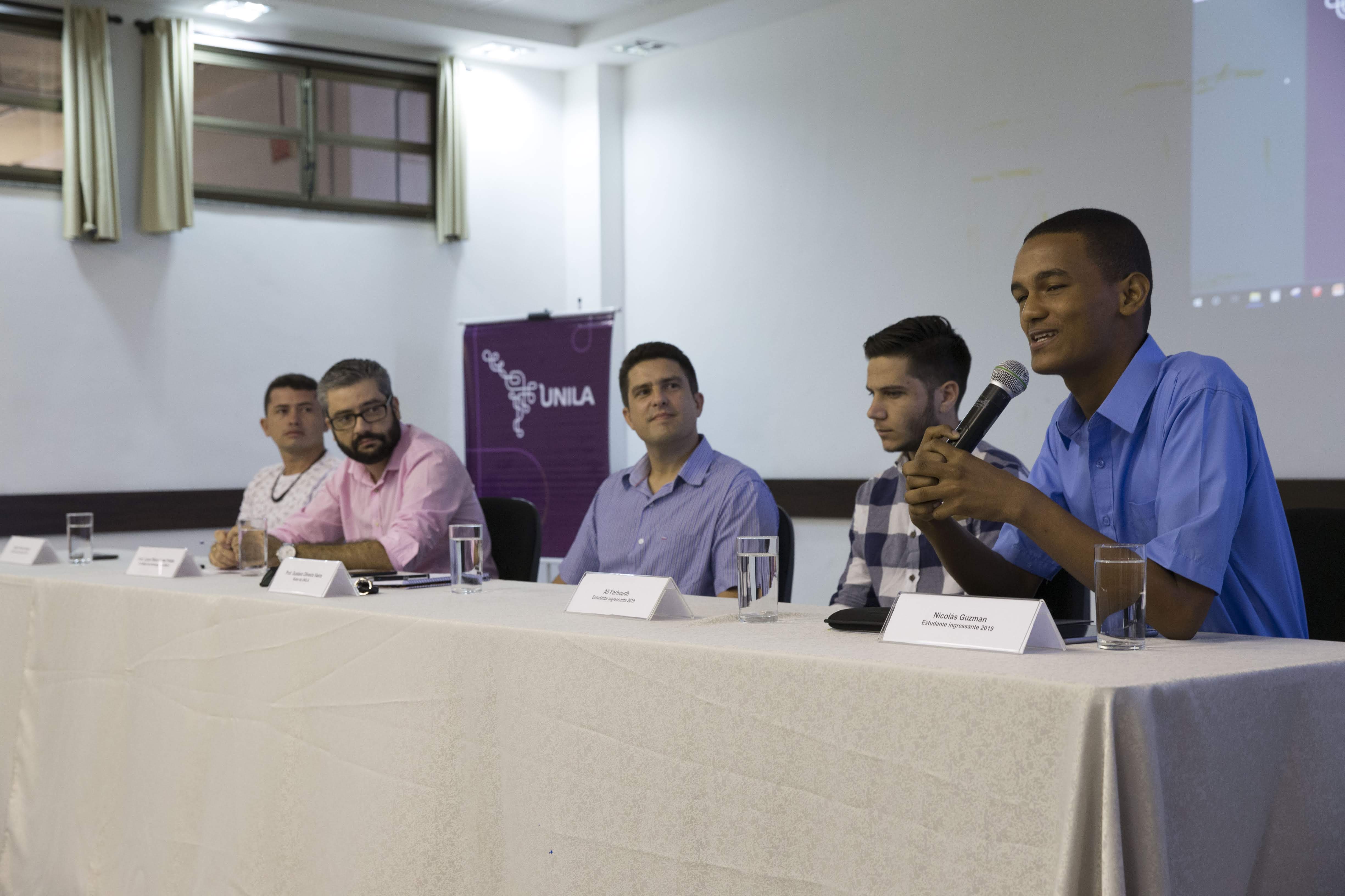 Mesa com os participantes da abertura: Edimar Nunes, Lucio Freitas, Gustavo Vieira, Ali Farhoudh, Nicolas Guzman